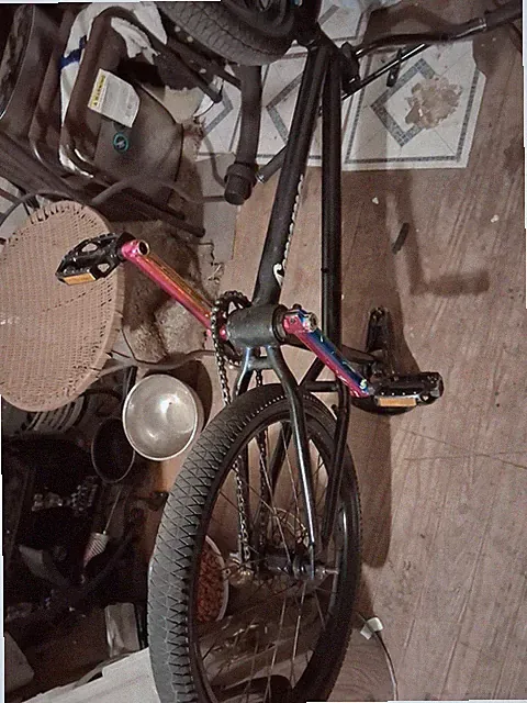 Black BMX Bike w/ BMX Bars, Mechanical Disc Brakes, Pegs, No Suspension